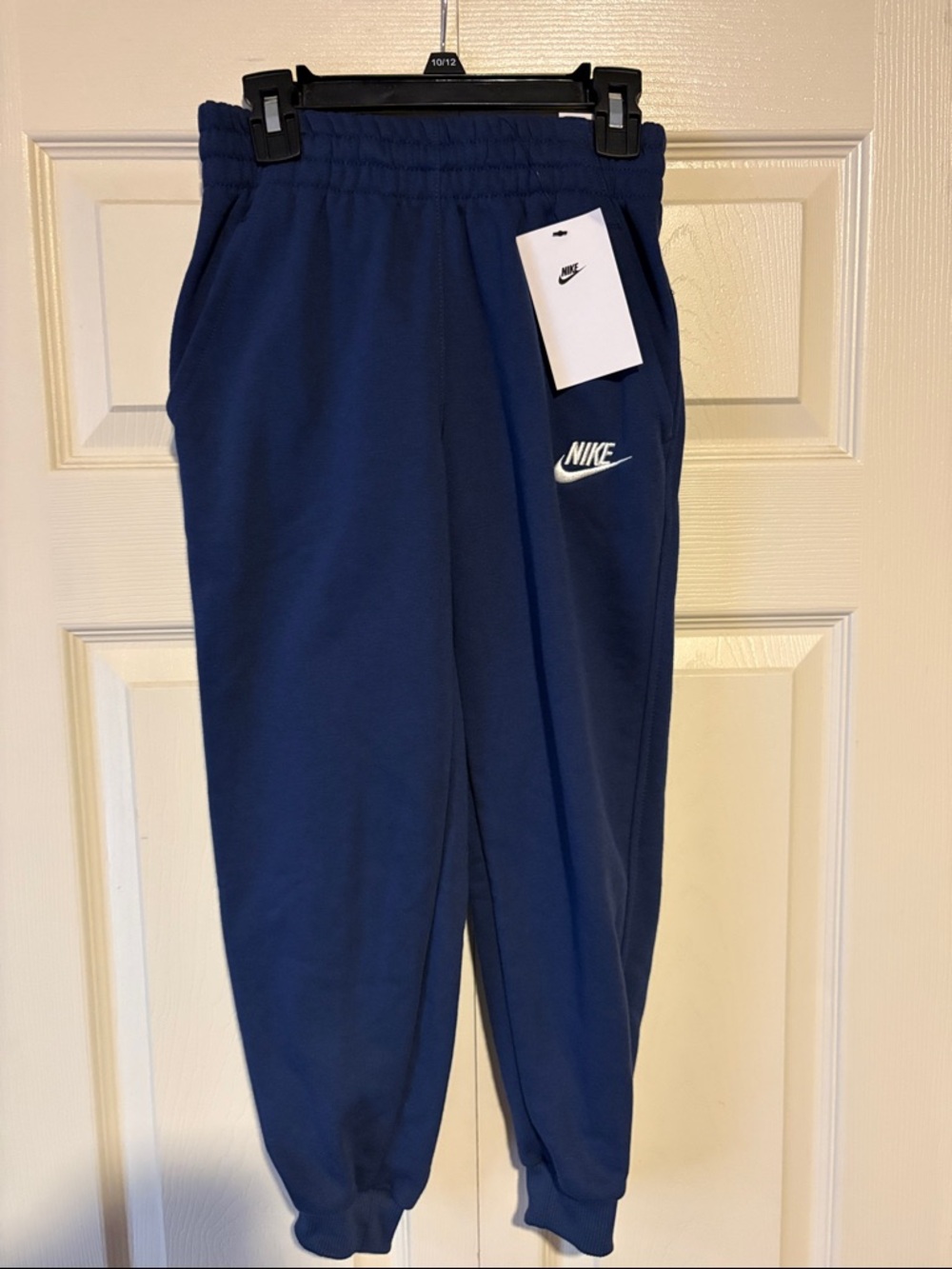 Nike Kids Navy Blue Fleece Joggers with White Logo
